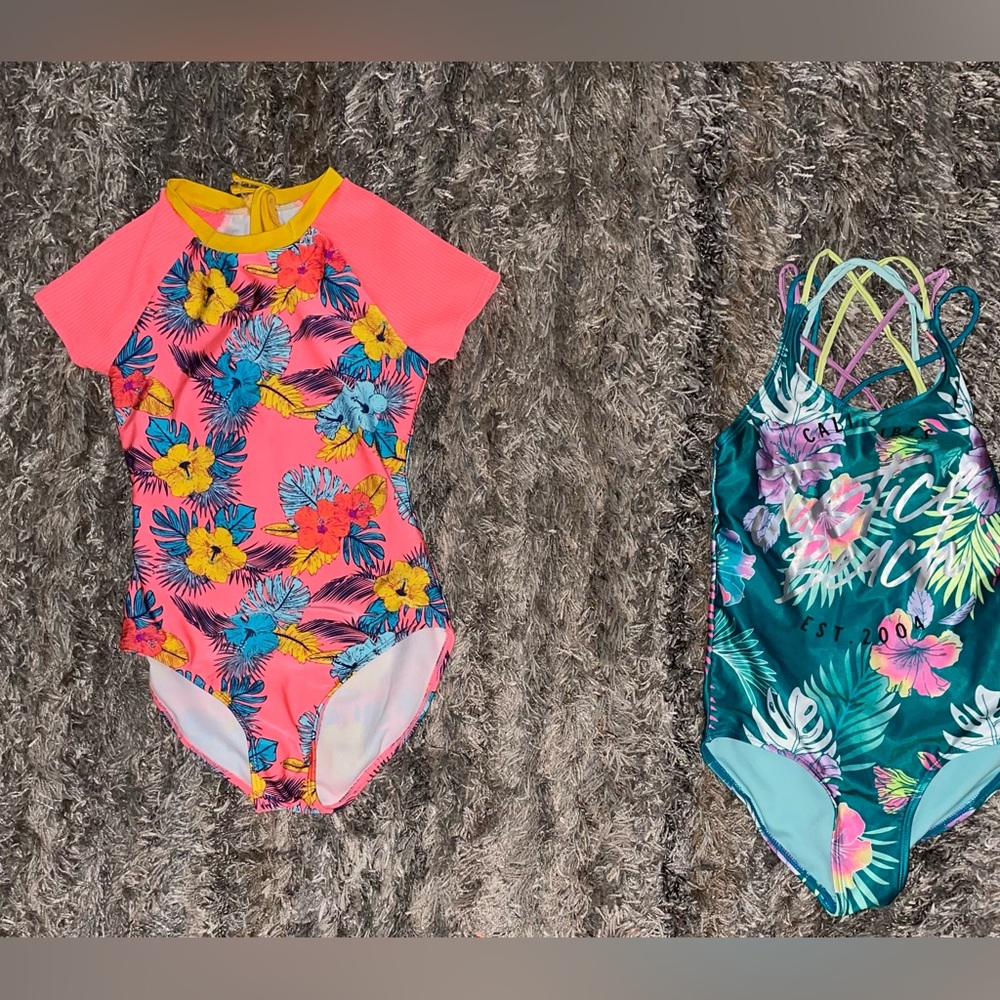 Girl swimsuits art class size L justice size M in good condition